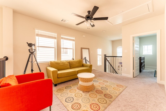 8849 Redding St, North Richland Hills, TX 76180 - carpeted living room with attic access and a ceiling fan