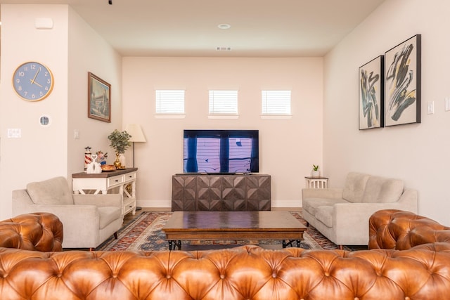 8849 Redding St, North Richland Hills, TX 76180 - living room with healthy amount of natural light and wood finished floors