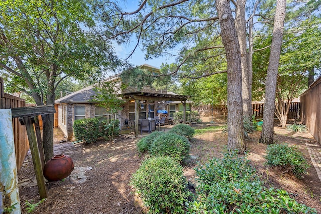 3301 Marymount Dr, Denton, TX 76210 - fenced backyard with a patio