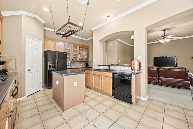 3301 Marymount Dr, Denton, TX 76210 - kitchen featuring black appliances, ornamental molding, open floor plan, a kitchen island, and dark countertops