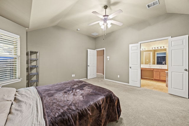 3301 Marymount Dr, Denton, TX 76210 - bedroom with light colored carpet, connected bathroom, high vaulted ceiling, and ceiling fan