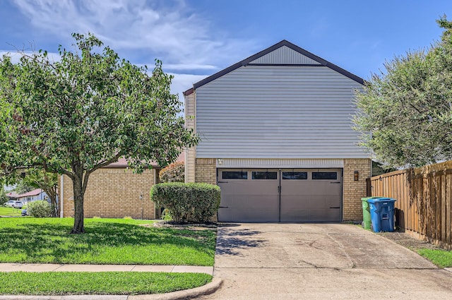 2202 Southern Ct, Carrollton, TX 75006 - view of side of home with brick siding, an attached garage, and concrete driveway