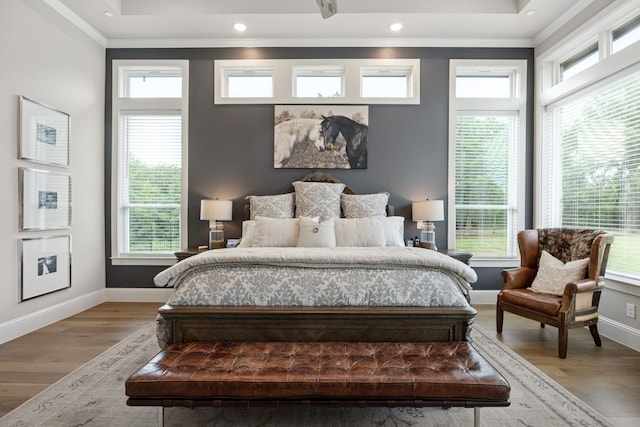 5724 Bellaria Ct, Flower Mound, TX 75022 - bedroom with ornamental molding, multiple windows, wood finished floors, recessed lighting, and a raised ceiling