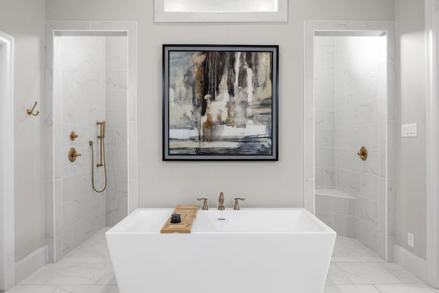 5724 Bellaria Ct, Flower Mound, TX 75022 - full bathroom with marble finish floors, a freestanding tub, and tiled shower