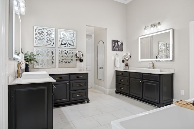5724 Bellaria Ct, Flower Mound, TX 75022 - full bath featuring two vanities, a freestanding bath, and marble look tile flooring