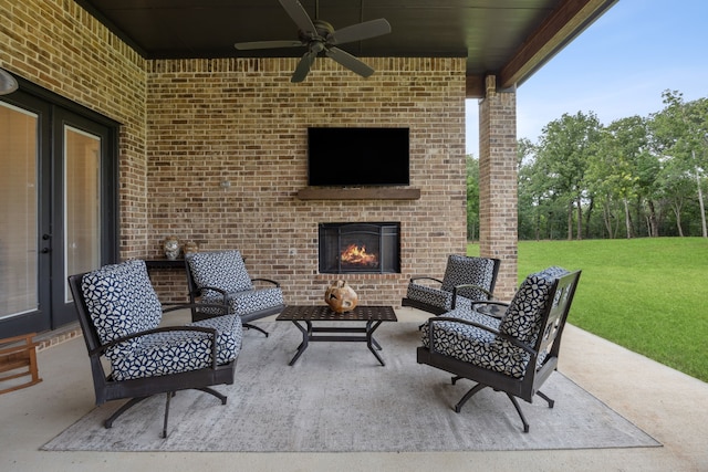 5724 Bellaria Ct, Flower Mound, TX 75022 - view of patio / terrace with ceiling fan and an outdoor living space with a fireplace