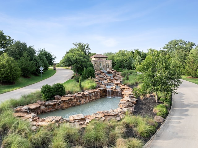 5724 Bellaria Ct, Flower Mound, TX 75022 - view of home's community featuring a small pond
