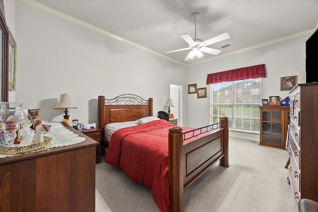 2918 Beau Dr, Mesquite, TX 75181 - bedroom with ornamental molding, light carpet, ceiling fan, and a textured ceiling