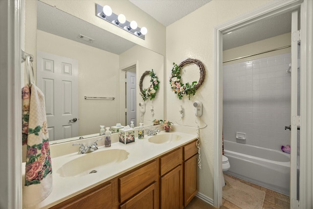 2918 Beau Dr, Mesquite, TX 75181 - full bath with double vanity and bathing tub / shower combination