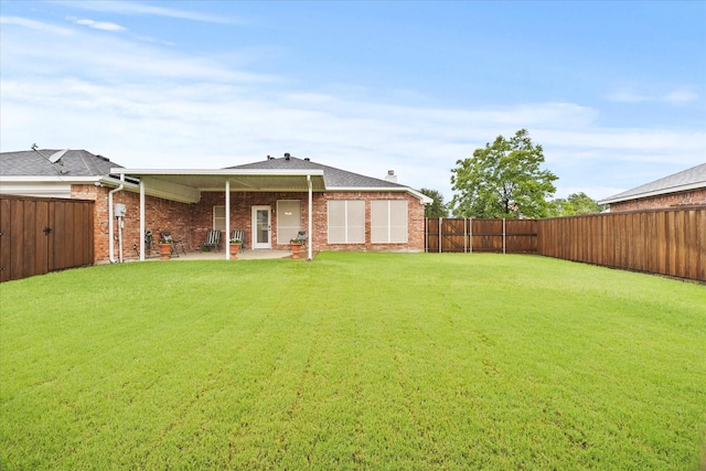 2918 Beau Dr, Mesquite, TX 75181 - fenced backyard featuring a patio area