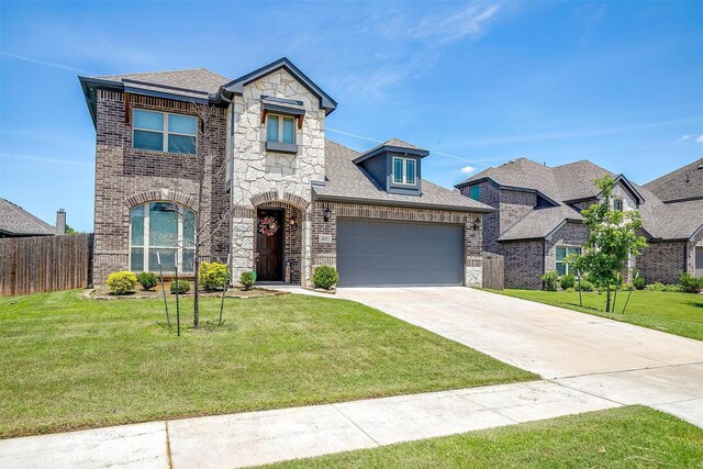 433 Joseph Ln, Crowley, TX 76036 - french country home featuring stone siding, concrete driveway, brick siding, and a shingled roof