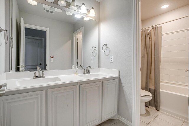 433 Joseph Ln, Crowley, TX 76036 - full bath featuring tile patterned floors, double vanity, and shower / bath combo