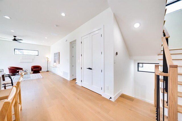 3825 Munger Ave, Dallas, TX 75206 - corridor with light wood-style floors, healthy amount of natural light, recessed lighting, and stairway