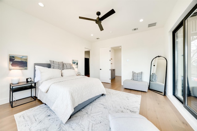 3825 Munger Ave, Dallas, TX 75206 - bedroom with light wood-style floors, a ceiling fan, and recessed lighting
