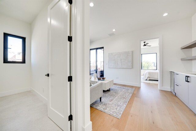 3825 Munger Ave, Dallas, TX 75206 - hall with light wood-style flooring, an office area, and recessed lighting