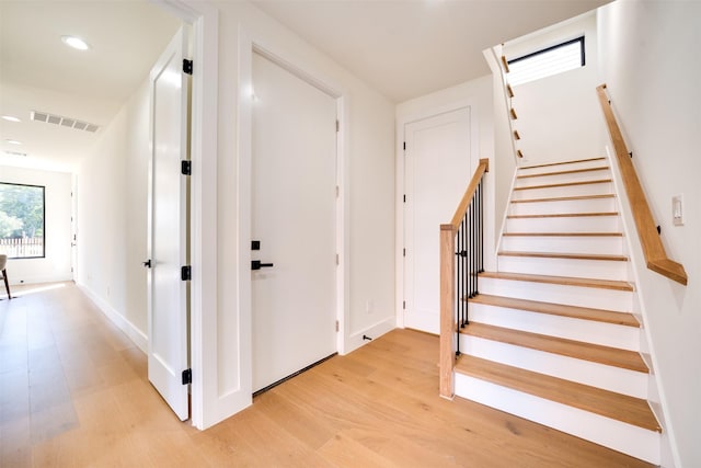 3825 Munger Ave, Dallas, TX 75206 - entrance foyer featuring light wood-type flooring, stairway, and recessed lighting
