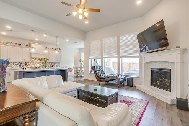 5729 Violet Crown Pl, Fort Worth, TX 76126 - living area with ceiling fan, light wood-style flooring, recessed lighting, and a fireplace
