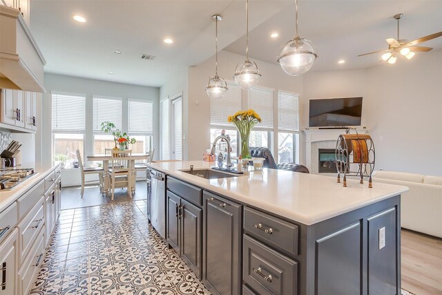 5729 Violet Crown Pl, Fort Worth, TX 76126 - kitchen with open floor plan, plenty of natural light, a ceiling fan, recessed lighting, and a high end fireplace