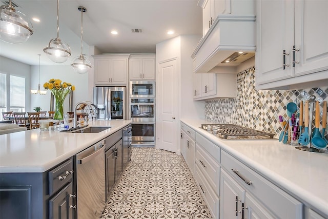 5729 Violet Crown Pl, Fort Worth, TX 76126 - kitchen featuring appliances with stainless steel finishes, white cabinets, light countertops, backsplash, and recessed lighting