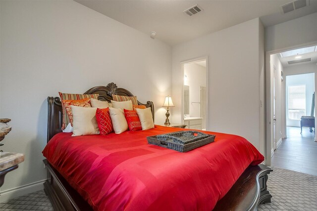 5729 Violet Crown Pl, Fort Worth, TX 76126 - bedroom featuring ensuite bath and wood finished floors