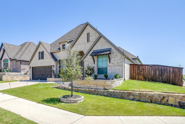 5729 Violet Crown Pl, Fort Worth, TX 76126 - french provincial home featuring brick siding, driveway, and an attached garage