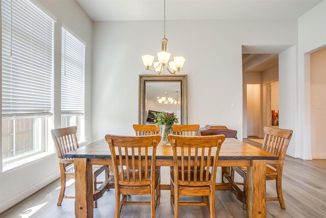 5729 Violet Crown Pl, Fort Worth, TX 76126 - dining area with a chandelier, healthy amount of natural light, and light wood-style flooring