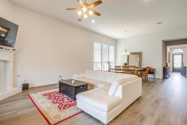 5729 Violet Crown Pl, Fort Worth, TX 76126 - living room featuring ceiling fan, light wood finished floors, a chandelier, and recessed lighting