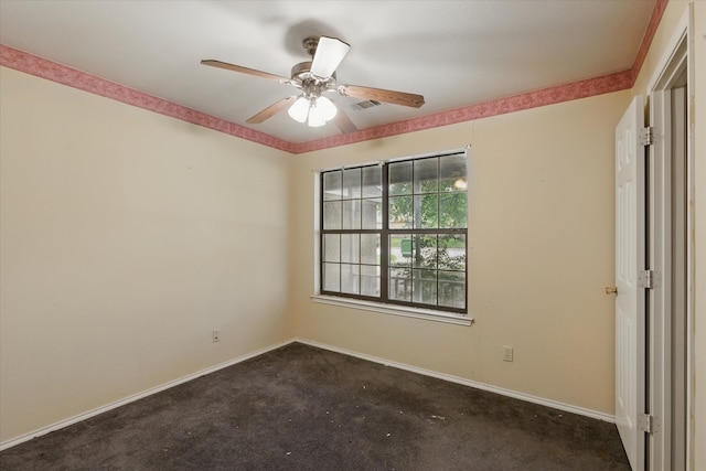 220 Brook Cir, Krum, TX 76249 - unfurnished room featuring dark colored carpet and ceiling fan