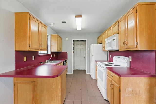 220 Brook Cir, Krum, TX 76249 - kitchen featuring white appliances, a peninsula, light tile patterned floors, and dark countertops