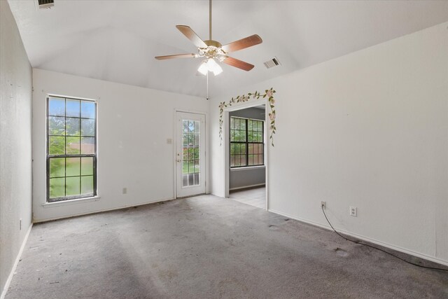 220 Brook Cir, Krum, TX 76249 - carpeted empty room featuring vaulted ceiling, healthy amount of natural light, and a ceiling fan