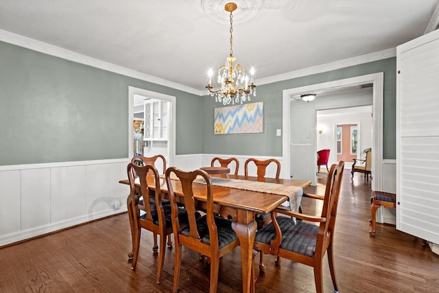 425 W Belden St, Sherman, TX 75092 - dining area with crown molding, wainscoting, a chandelier, and dark wood-style floors