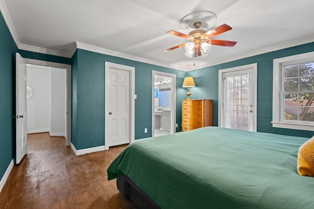 425 W Belden St, Sherman, TX 75092 - bedroom featuring wood finished floors, crown molding, a textured wall, connected bathroom, and a ceiling fan
