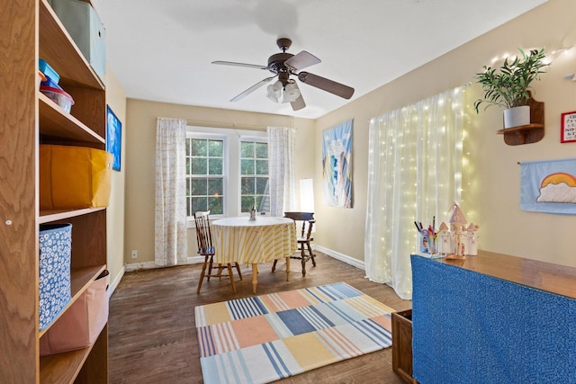 425 W Belden St, Sherman, TX 75092 - dining area with ceiling fan and dark wood-style flooring