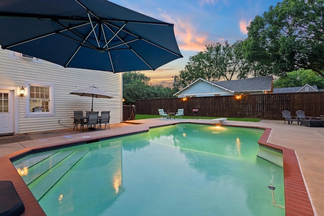 425 W Belden St, Sherman, TX 75092 - view of swimming pool with a patio, an outdoor fire pit, a fenced backyard, and outdoor dining area