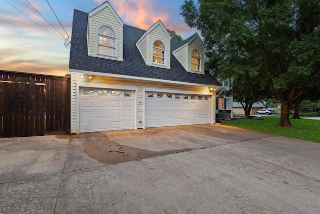 425 W Belden St, Sherman, TX 75092 - view of front of house with a garage, roof with shingles, and driveway