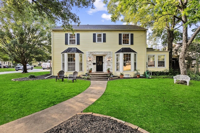 425 W Belden St, Sherman, TX 75092 - view of front facade with a front lawn