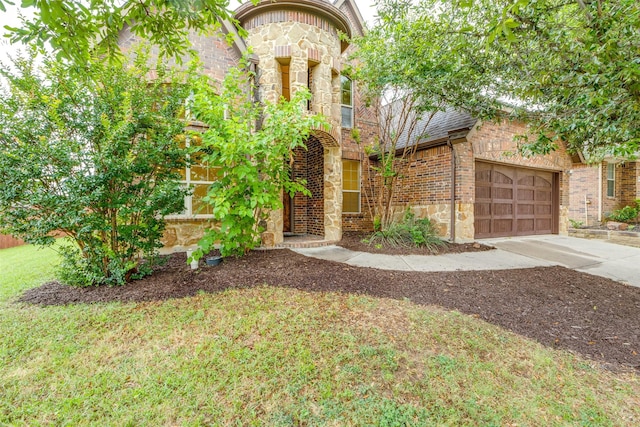 302 Shire Ln, Celina, TX 75009 - view of front of home featuring concrete driveway, stone siding, and brick siding