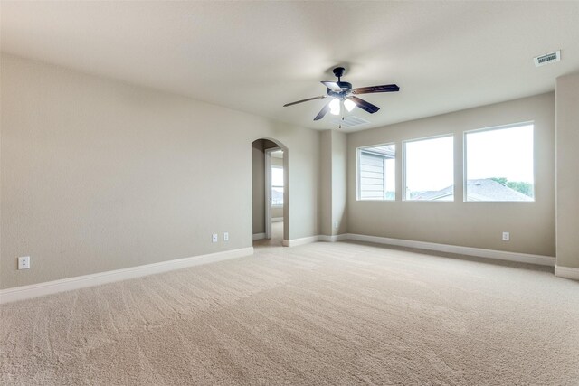 302 Shire Ln, Celina, TX 75009 - unfurnished room with arched walkways, a ceiling fan, and light carpet