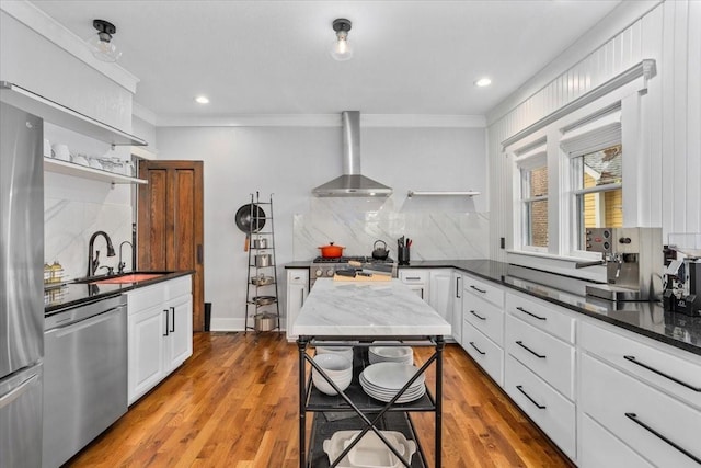 1600 S Adams St, Fort Worth, TX 76104 - kitchen with wall chimney range hood, open shelves, stainless steel appliances, ornamental molding, and decorative backsplash