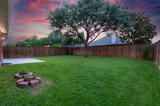 1637 Thornhill Ln, Little Elm, TX 75068 - yard at dusk featuring a fenced backyard and a patio area