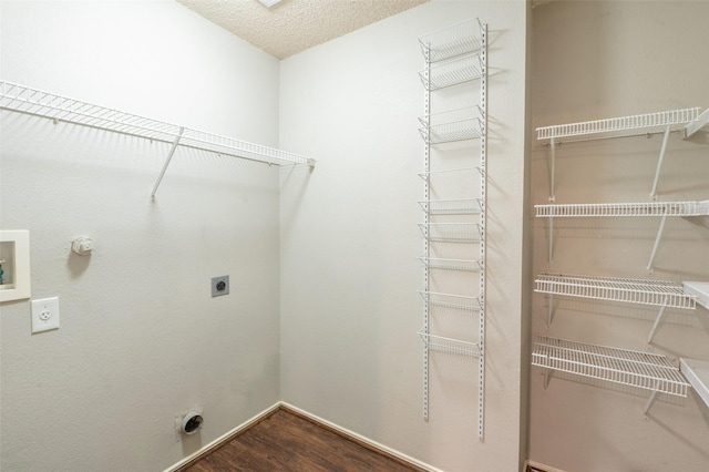1637 Thornhill Ln, Little Elm, TX 75068 - washroom with hookup for an electric dryer, dark wood-style flooring, gas dryer hookup, and hookup for a washing machine