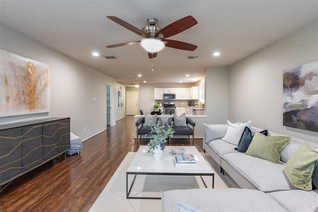 1637 Thornhill Ln, Little Elm, TX 75068 - living area with recessed lighting, a ceiling fan, wood finished floors, and a textured ceiling