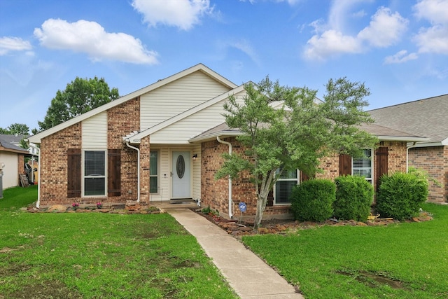 4109 Malone Ave, The Colony, TX 75056 - view of front of home featuring brick siding and a front yard
