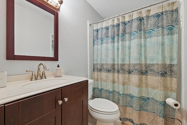 4109 Malone Ave, The Colony, TX 75056 - bathroom featuring vanity, a textured ceiling, curtained shower, and a textured wall