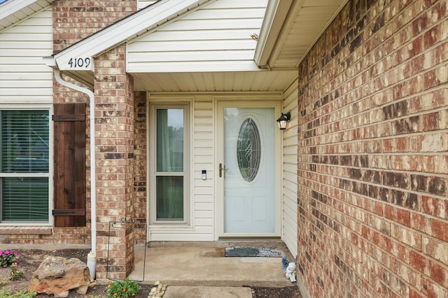 4109 Malone Ave, The Colony, TX 75056 - doorway to property featuring brick siding
