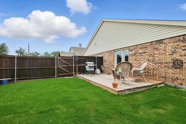 4109 Malone Ave, The Colony, TX 75056 - fenced backyard featuring a wooden deck and a gate
