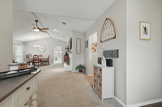 4109 Malone Ave, The Colony, TX 75056 - hall featuring lofted ceiling, light colored carpet, and a chandelier