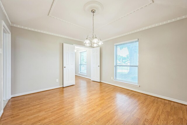 2413 Golden Willow Ln, Richardson, TX 75082 - unfurnished room featuring a chandelier and light wood-type flooring