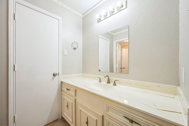 2413 Golden Willow Ln, Richardson, TX 75082 - bathroom with ornamental molding and vanity
