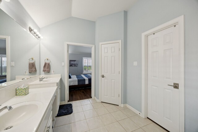 418 Long Cove Ct, Allen, TX 75002 - full bathroom featuring ensuite bathroom, double vanity, tile patterned floors, and lofted ceiling